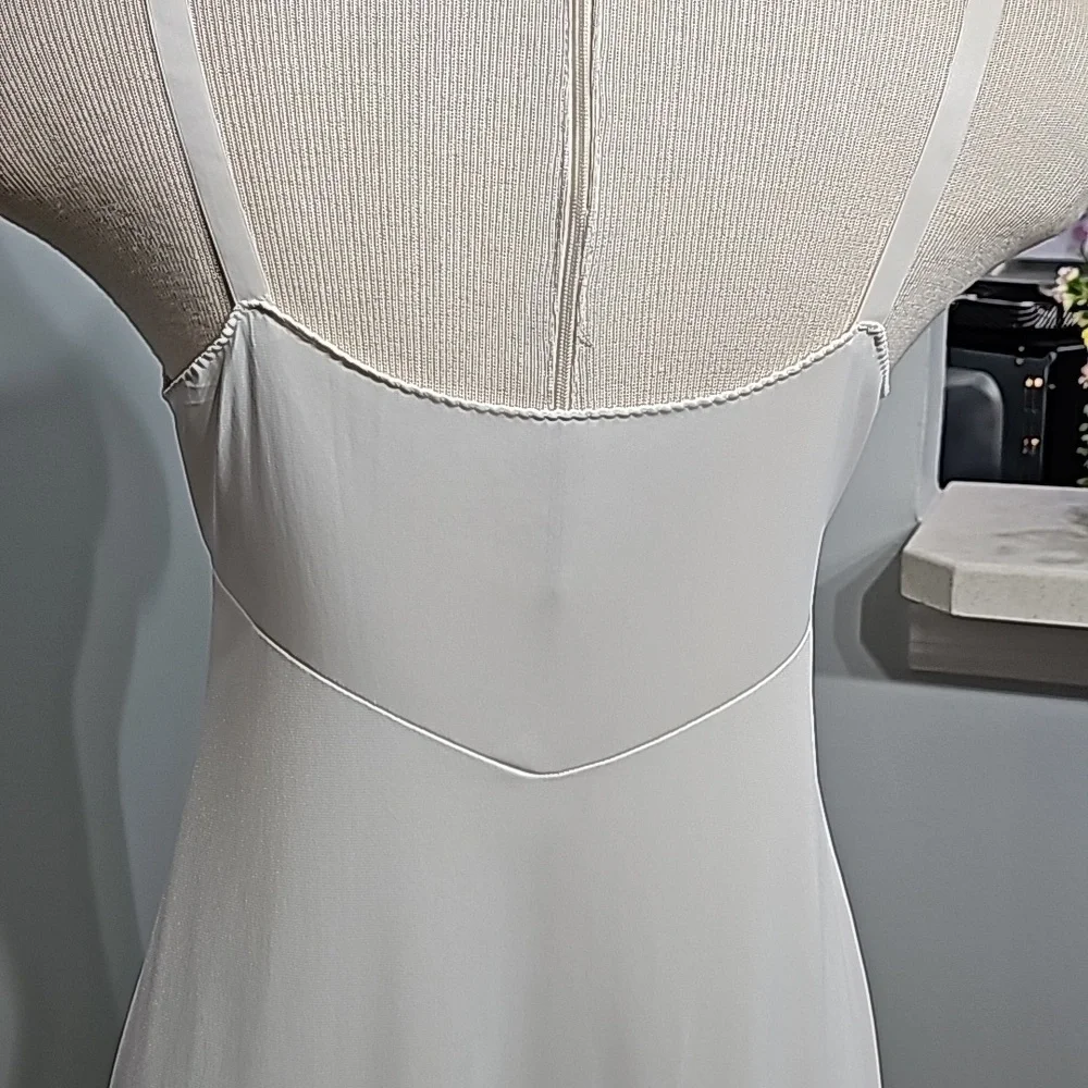 Vintage sears slip. Size 34 formal length.‎ Adjustable straps. Off white.